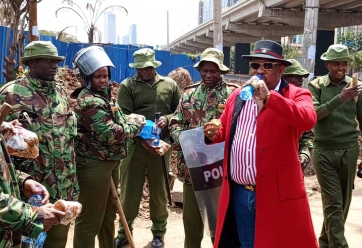 File image of Mike Sonko with police officers in Nairobi.